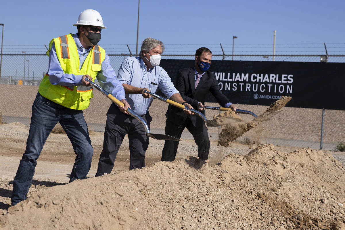 Commissioner Tick Segerblom, center, Kyle Kubatzike, left, director of William and Charles Cons ...