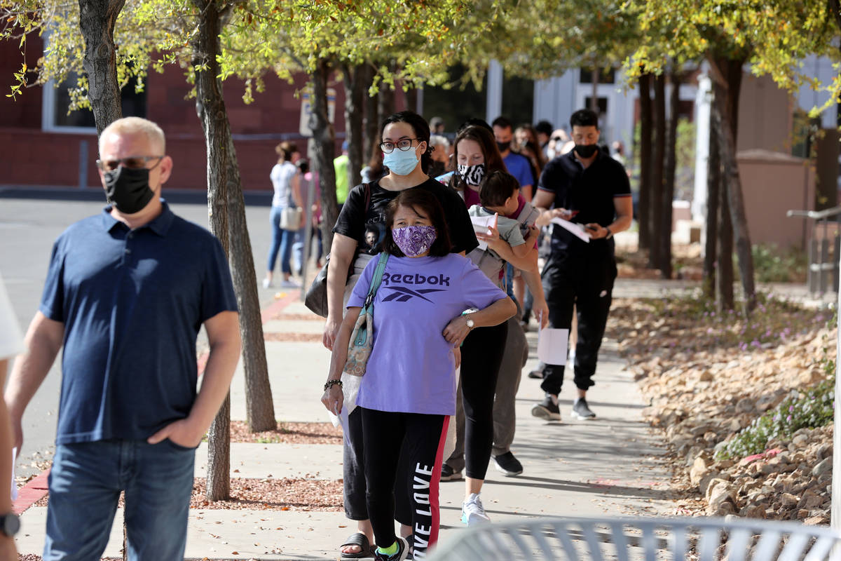People line up at the UNLV vaccination site Monday, April 5, 2021. All Nevadans 16 and older ar ...