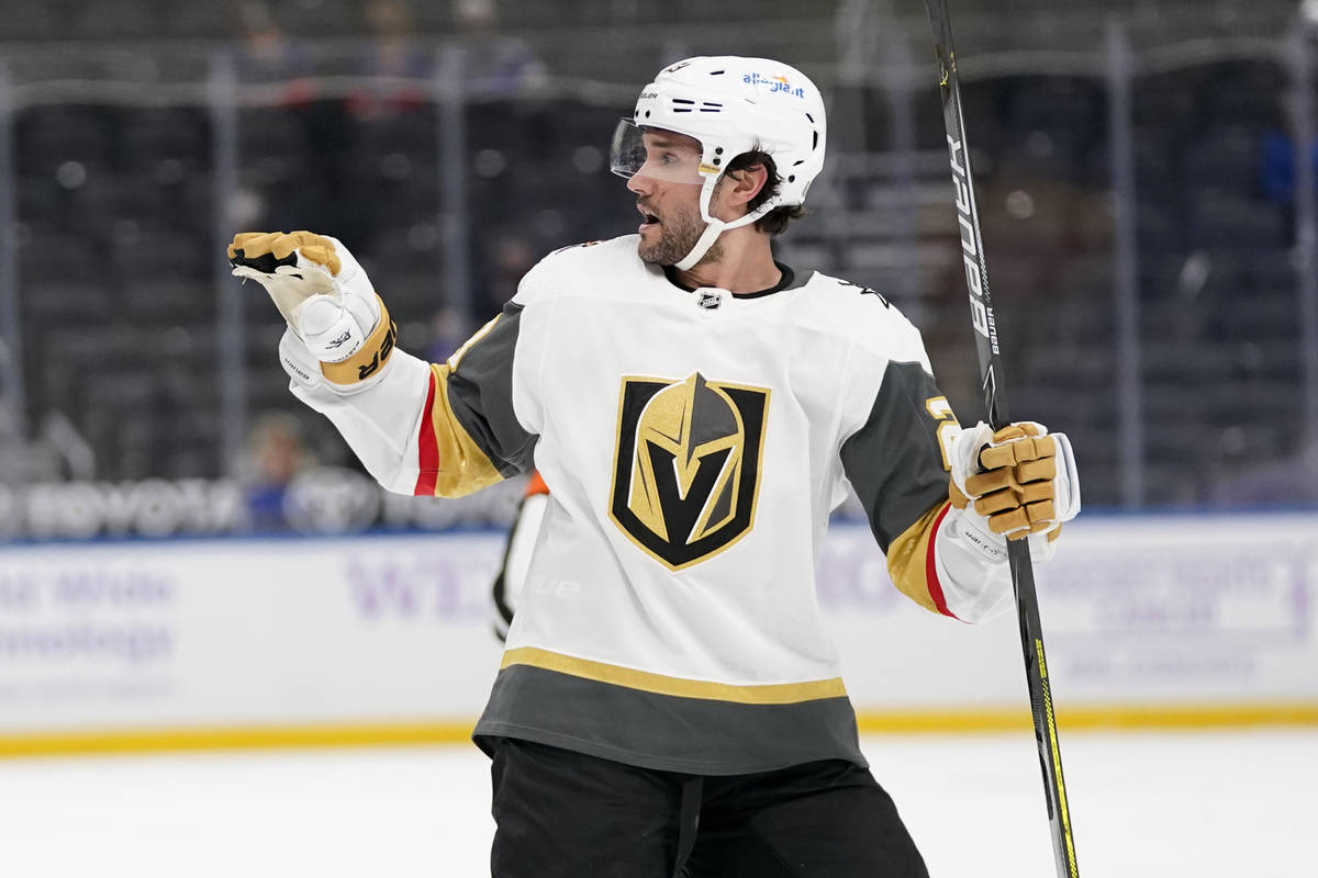 Vegas Golden Knights' Alec Martinez (23) celebrates after scoring during the first period of an ...