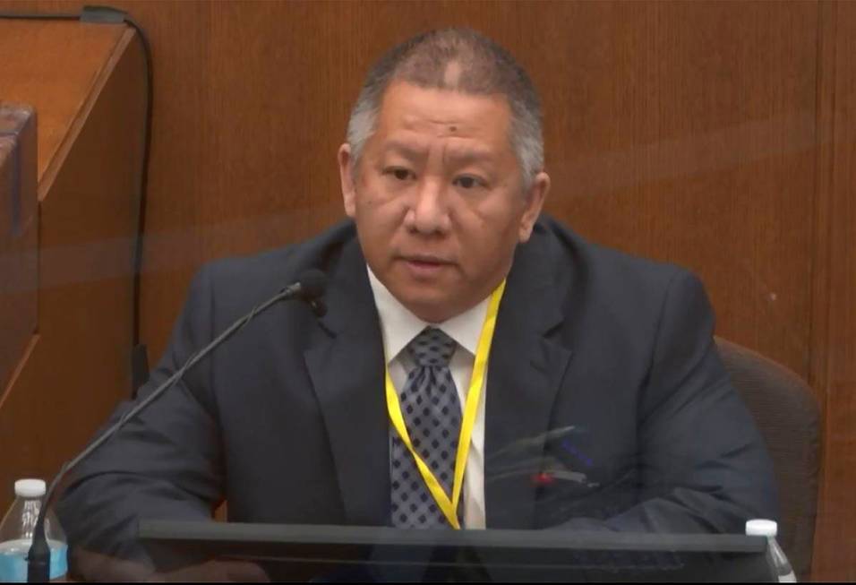 In this image from video, Minneapolis Police Crisis Intervention Coordinator Ker Yang testifies ...