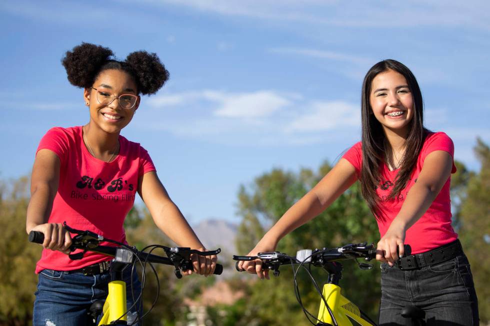 Bella Hawkins, 15, and Aiyana Castro, 12, at Radiant Ruby Park on Friday, April 9, 2021, in Las ...