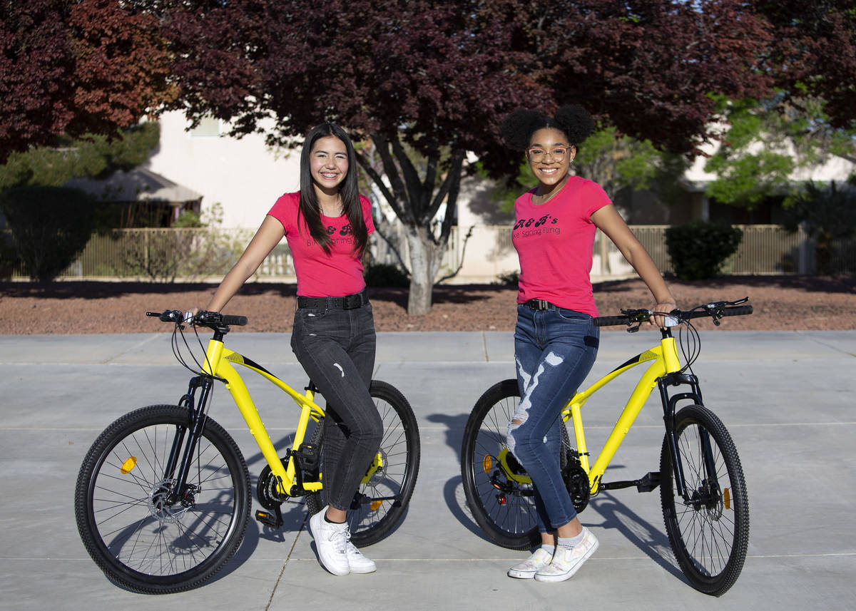 Aiyana Castro,12, and Bella Hawkins,15, at Radiant Ruby Park on Friday, April 9, 2021, in Las V ...