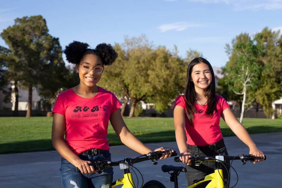 Bella Hawkins, 15, and Aiyana Castro, 12, at Radiant Ruby Park on Friday, April 9, 2021, in Las ...