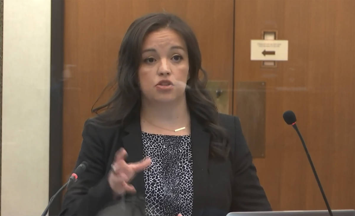 In this image from video, Adrienne Cousins, public defender for Morries Hall, speaks as He ...