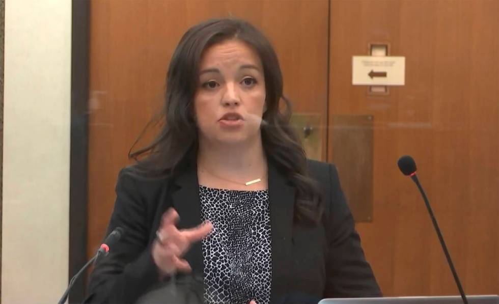 In this image from video, Adrienne Cousins, public defender for Morries Hall, speaks as He ...