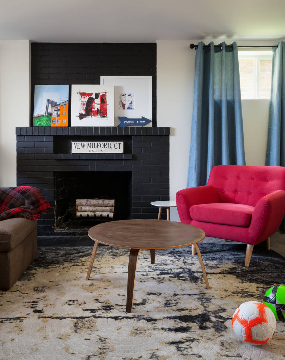 Seriously Happy Homes After: By exposing the brick chimney to the ceiling and painting it black ...