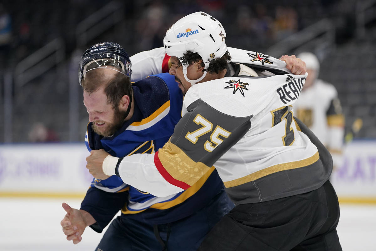 St. Louis Blues' Kyle Clifford, left, and Vegas Golden Knights' Ryan Reaves (75) fight during t ...
