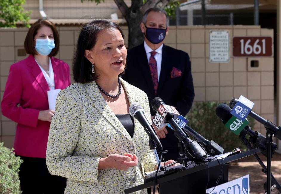 Jhone Ebert, Nevada superintendent of public instruction, talks to the news media with Sen. Cat ...