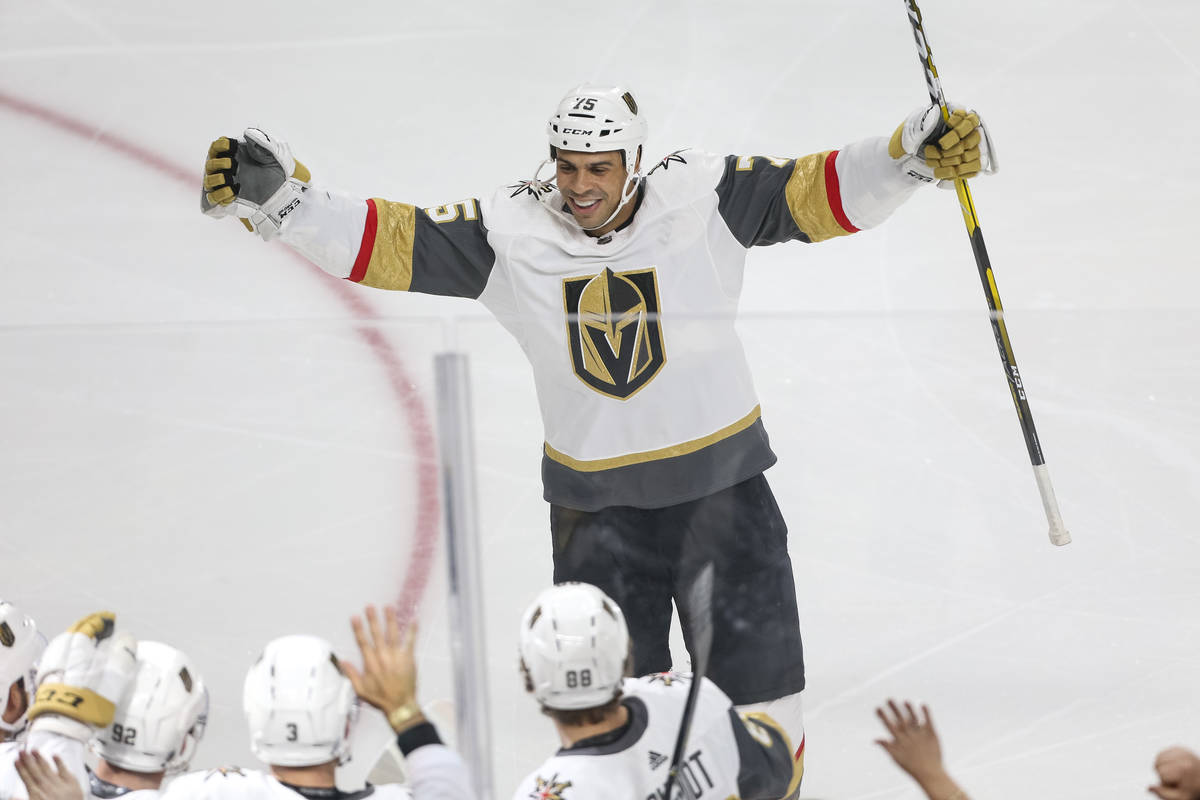 Vegas Golden Knights right wing Ryan Reaves (75) skates to his teammates to celebrate a first p ...