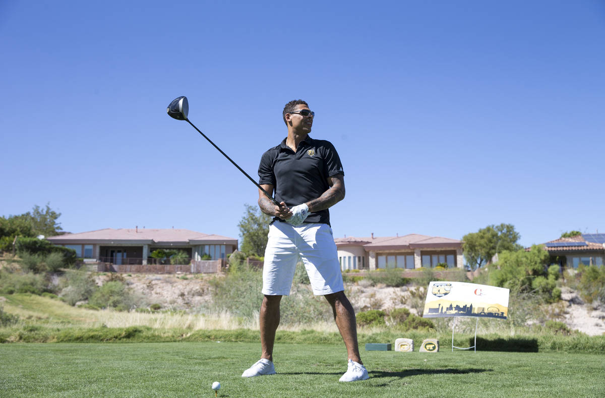 Vegas Golden Knights right wing Ryan Reaves prepares to tee off during the Vegas Golden Knights ...