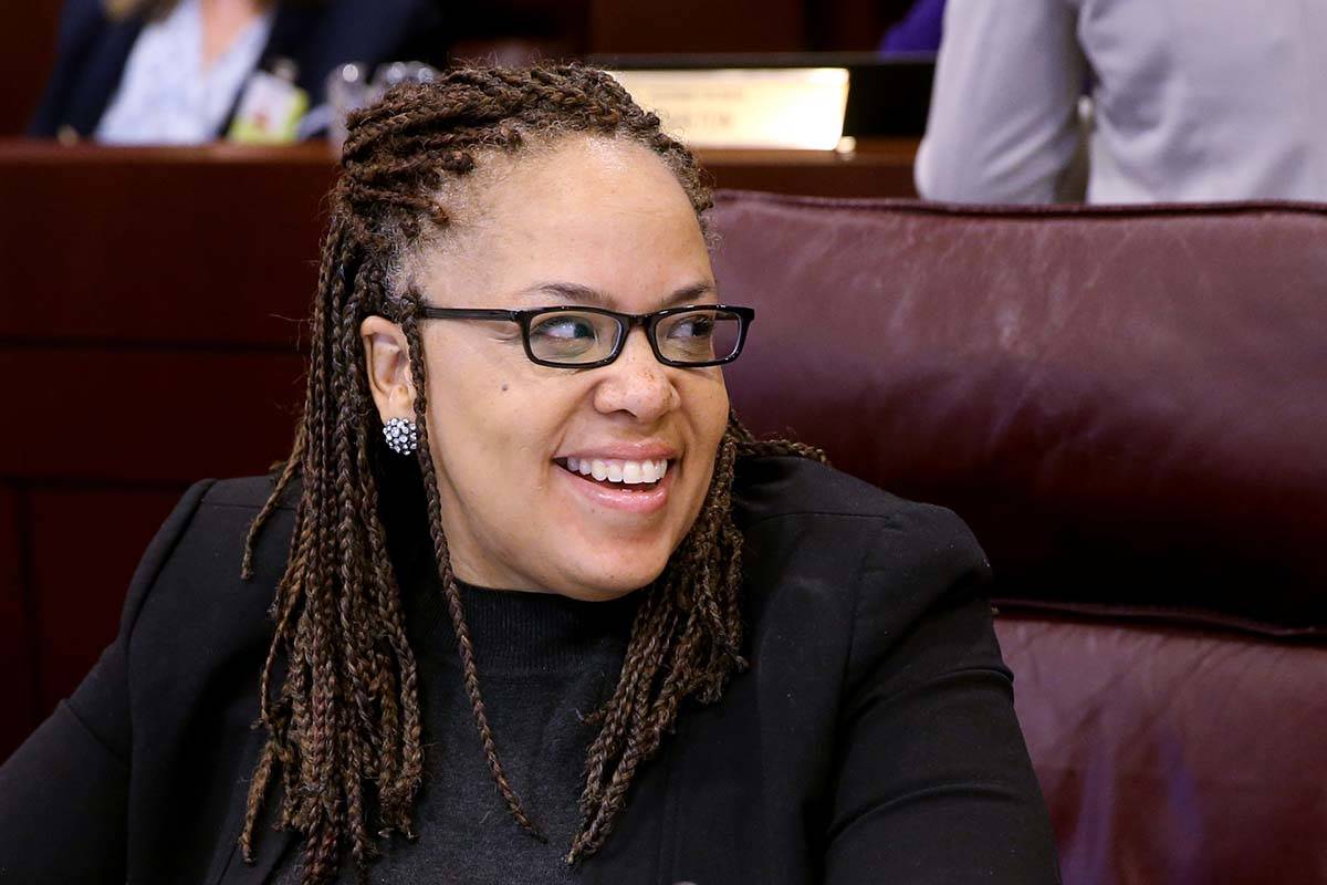 Assemblywoman Dina Neal D-North Las Vegas, prepares for a joint meeting of the Senate Finance C ...
