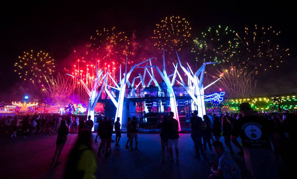 Fireworks go off above the Forest House art car during the first day of the Electric Daisy Carn ...