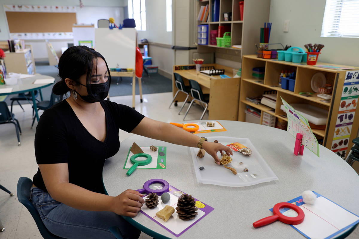 Teachers assistant Angela Hofer sets up a classroom at Capstone Christian Academy in Las Vegas ...