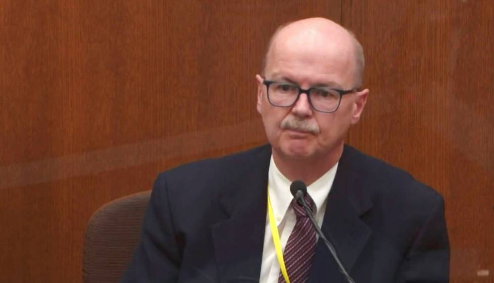 In this image taken from video witness Daniel Isenschmid, a forensic toxicologist testifies as ...