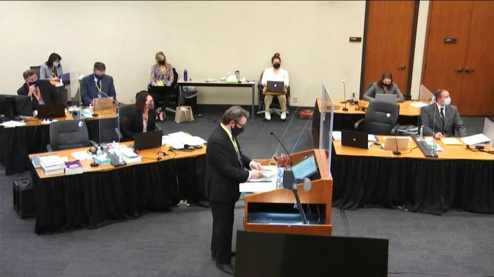 In this image taken from video, defense attorney Eric Nelson questions witness Daniel Isenschmi ...