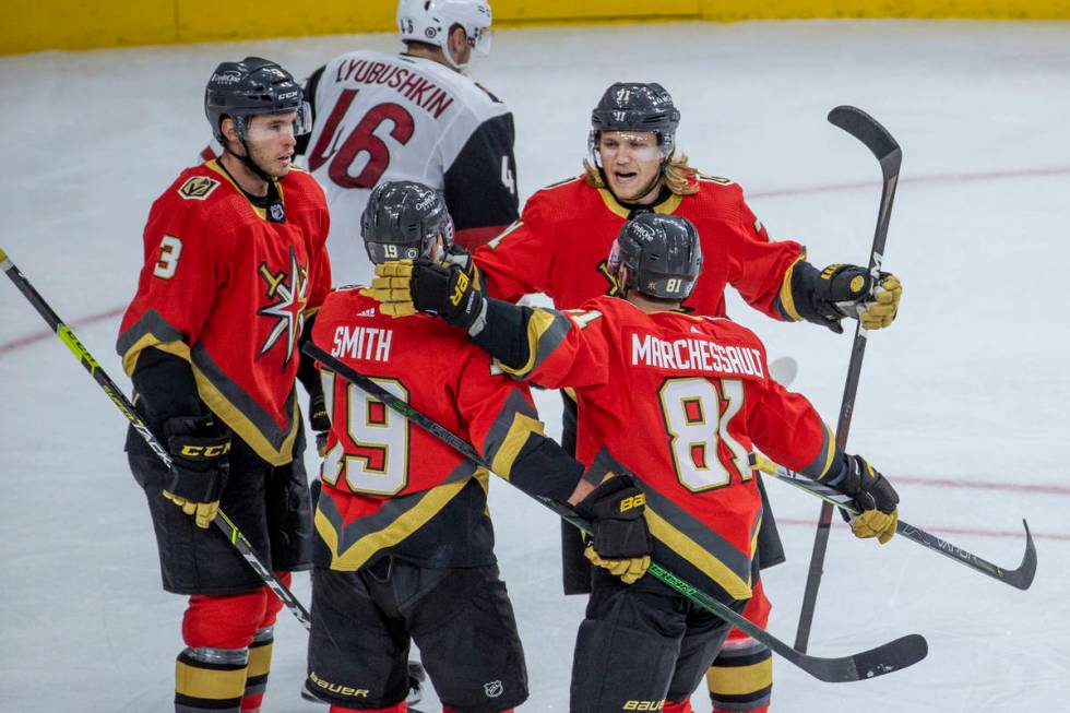 Teammates congratulate Golden Knights right wing Reilly Smith (19) on another goal versus the A ...