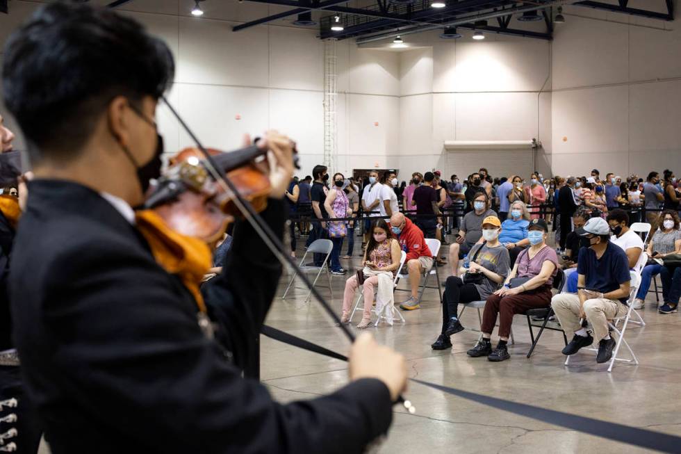 Mariachi Nuestra Raíces performs at the vaccine site at Cashman Center on Saturday, April ...