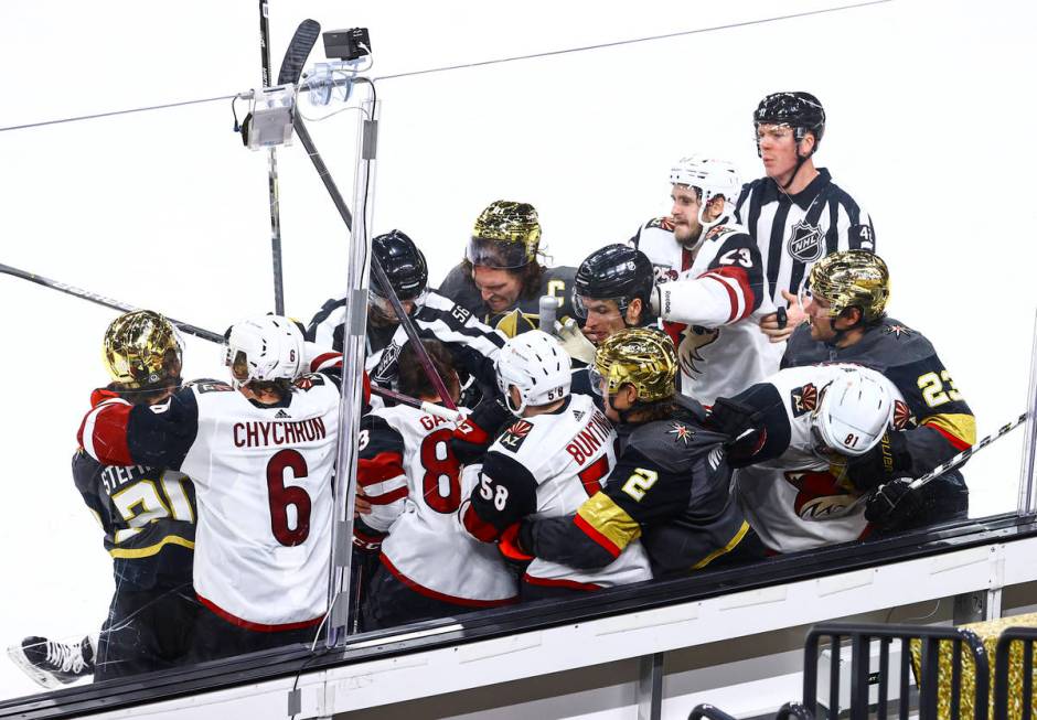 The Golden Knights get into an altercation with the Arizona Coyotes during the third period of ...