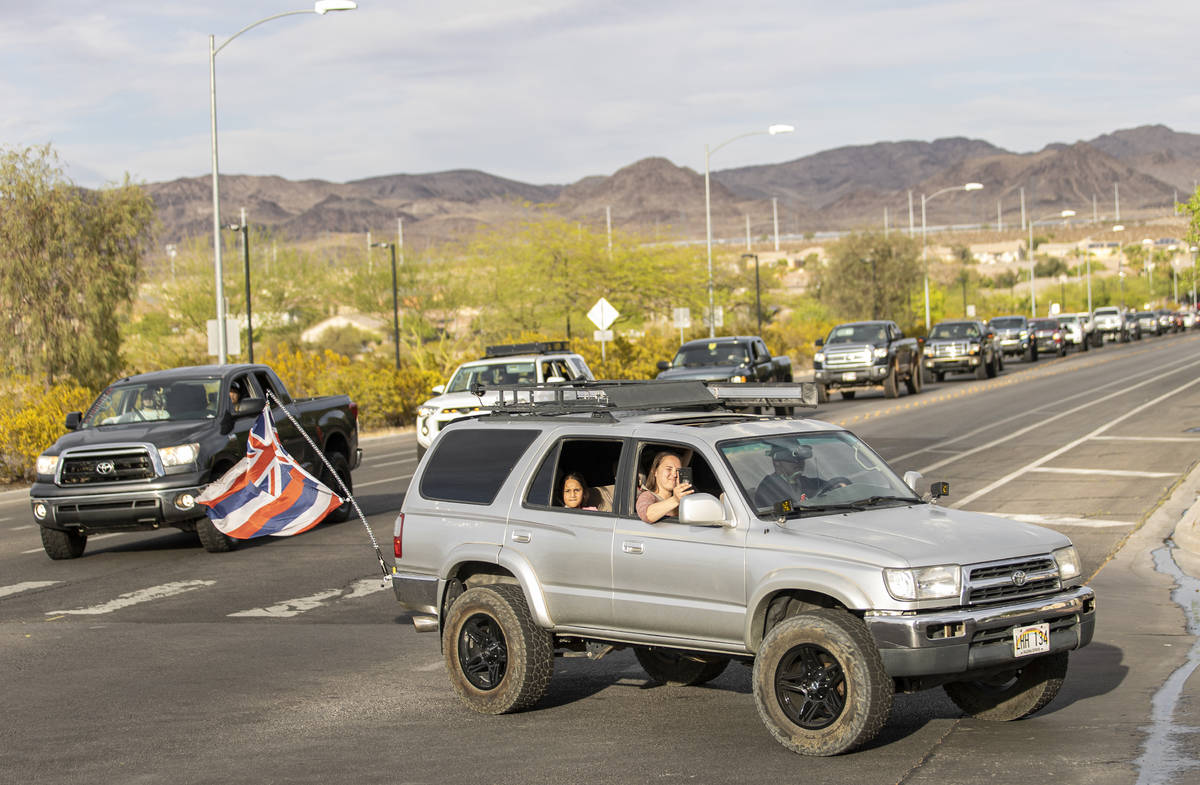 Hundreds of trucks pack Newport Drive in Henderson during a vehicle parade hosted by Sin City T ...