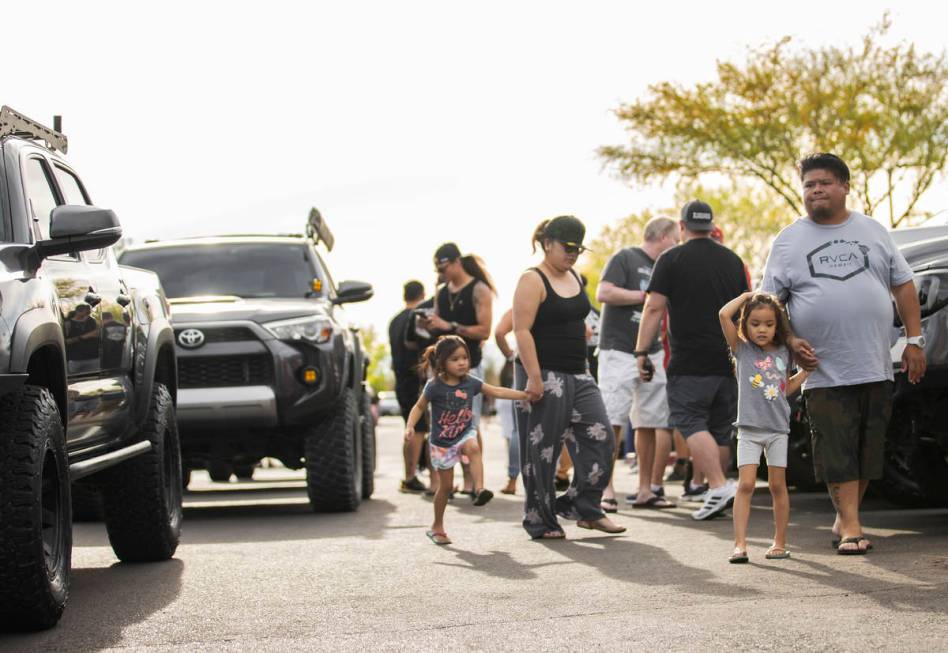 Members of Sin City Tundras wait to start a vehicle parade to support 9-year-old Aaliyah Velasq ...