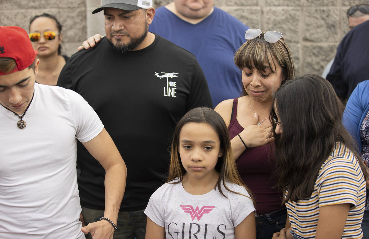 Carmen Velasquez, top/right, mother of Aaliyah Velasquez, 9, holds back tears while speaking at ...