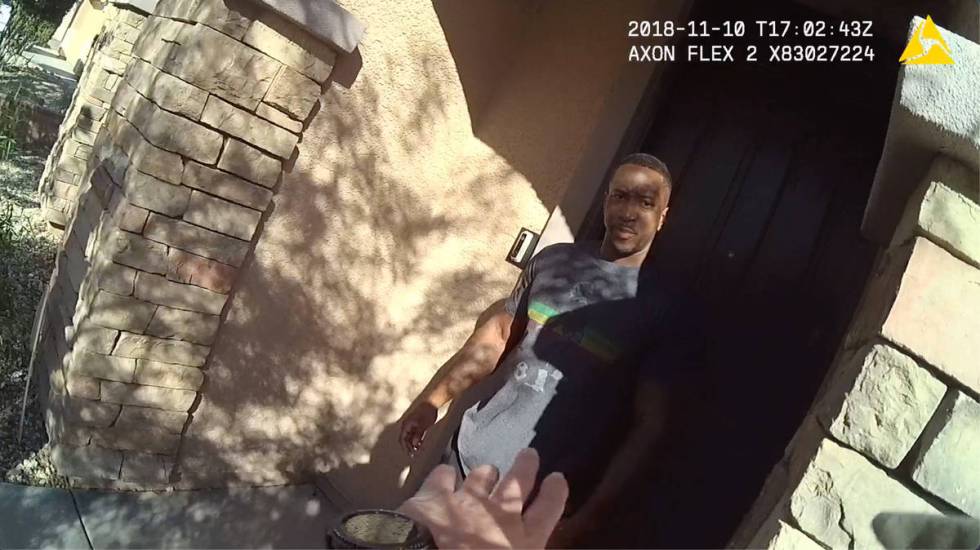 Metro police bodycam video screenshot shows Henderson corrections officer Darius Brown in the d ...