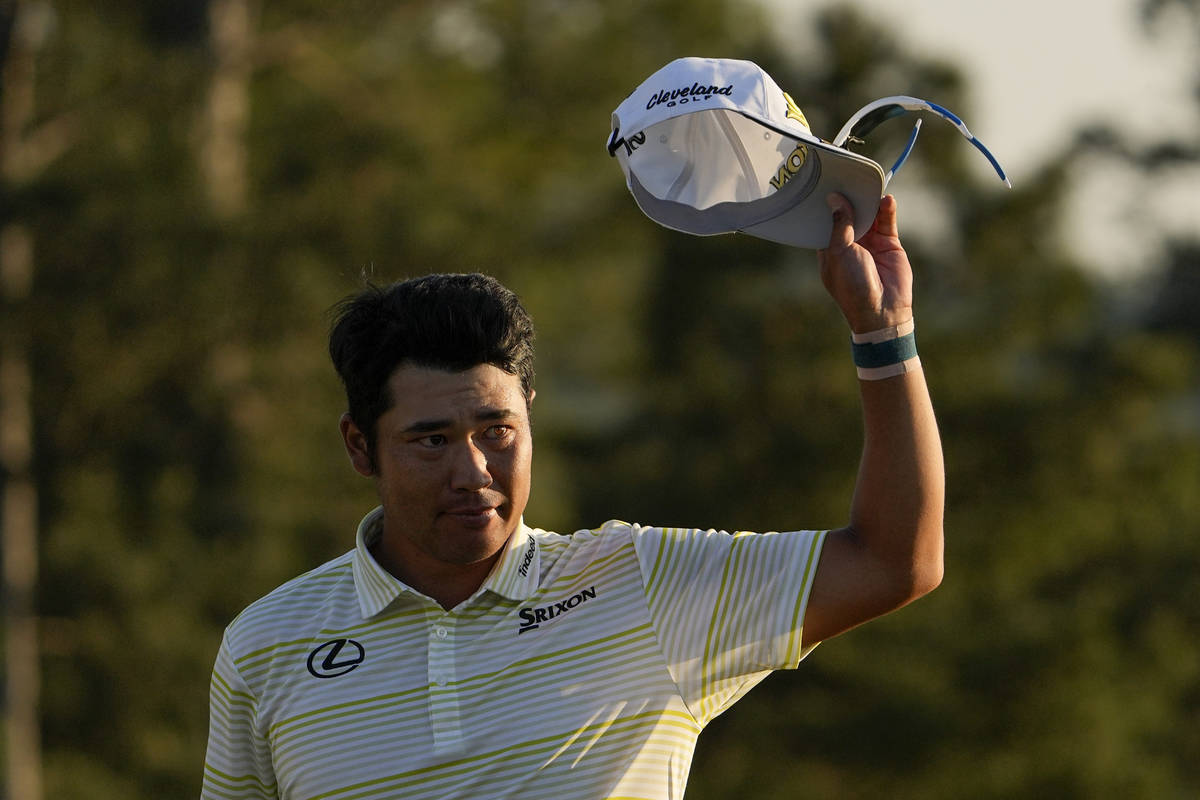 Hideki Matsuyama, of Japan, waves after winning the Masters golf tournament on Sunday, April 11 ...