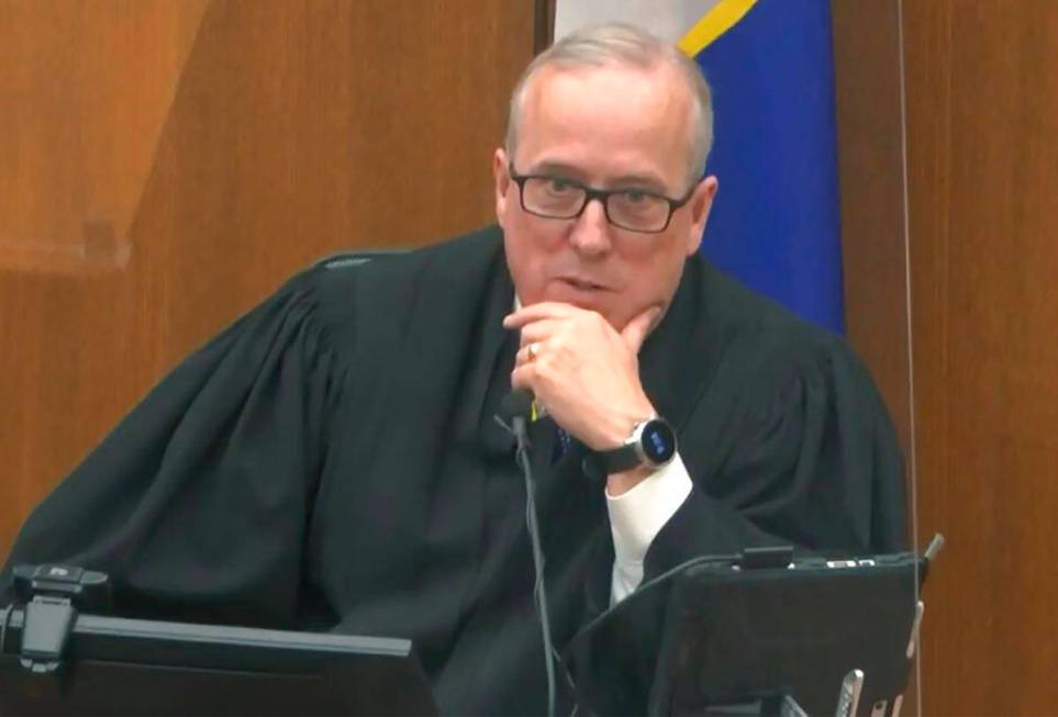 In this image from video, Hennepin County Judge Peter Cahill discusses motions before the ...