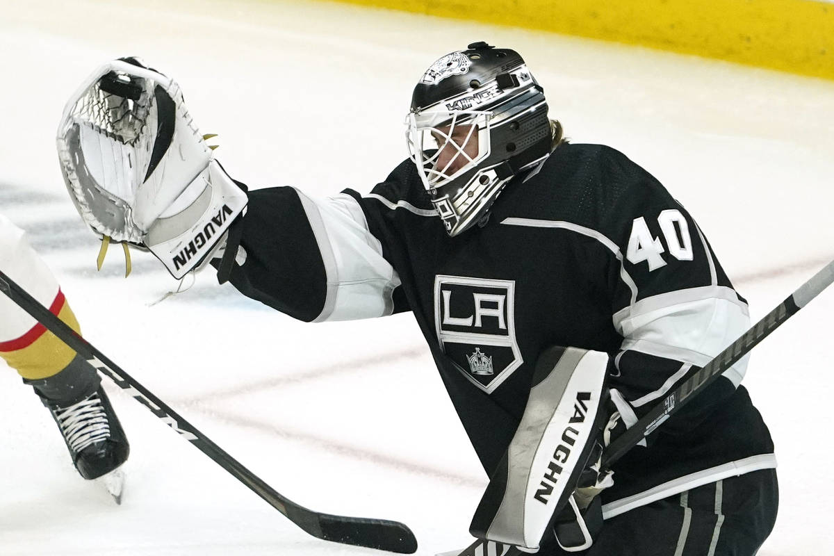Los Angeles Kings goaltender Calvin Petersen makes a glove save during the first period of an N ...