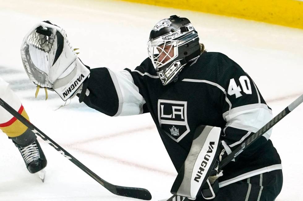 Los Angeles Kings goaltender Calvin Petersen makes a glove save during the first period of an N ...