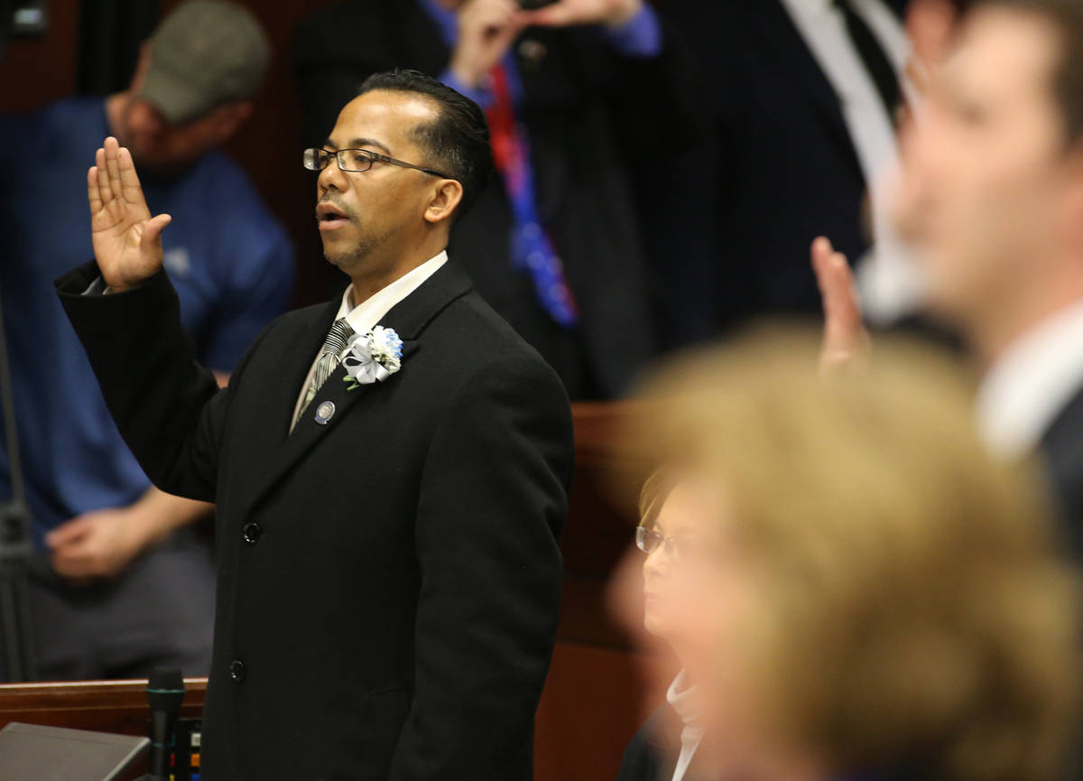 Steven Brooks, D-North Las Vegas, takes the oath of office during the opening day of the 77th L ...
