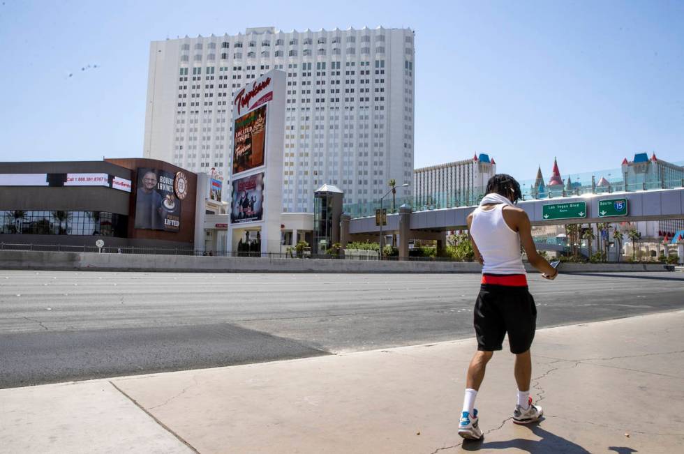 A pedestrian walks outside the MGM Grand, across from the Tropicana in Las Vegas. Bally's Corp. ...