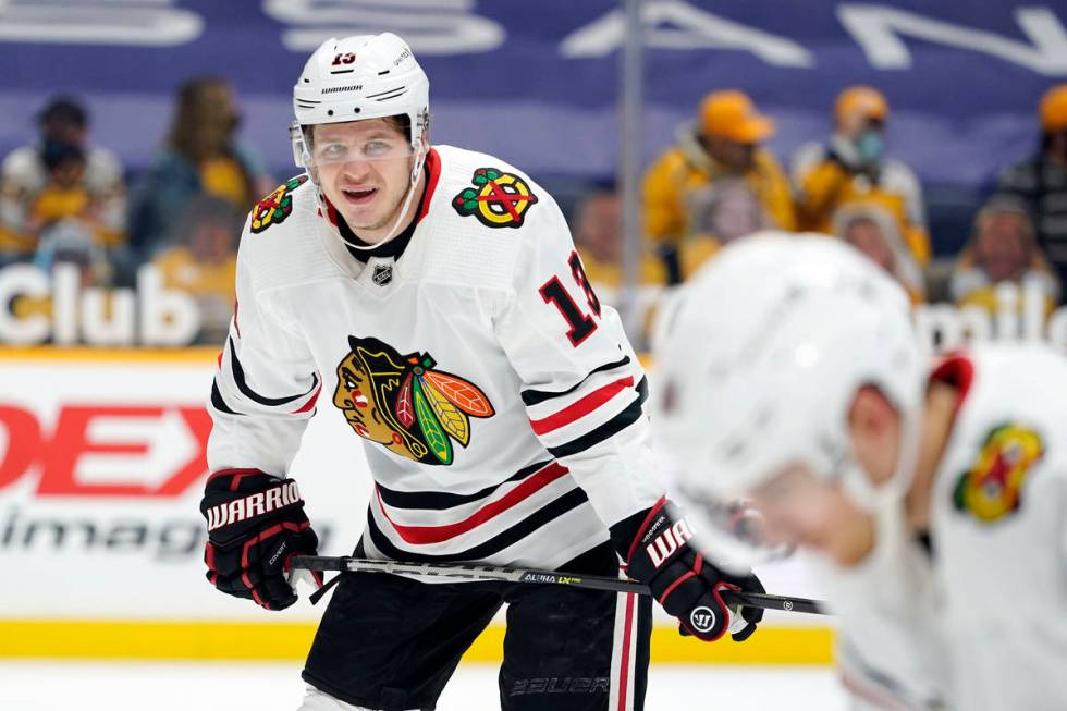 Chicago Blackhawks center Mattias Janmark (13) plays against the Nashville Predators in the fir ...