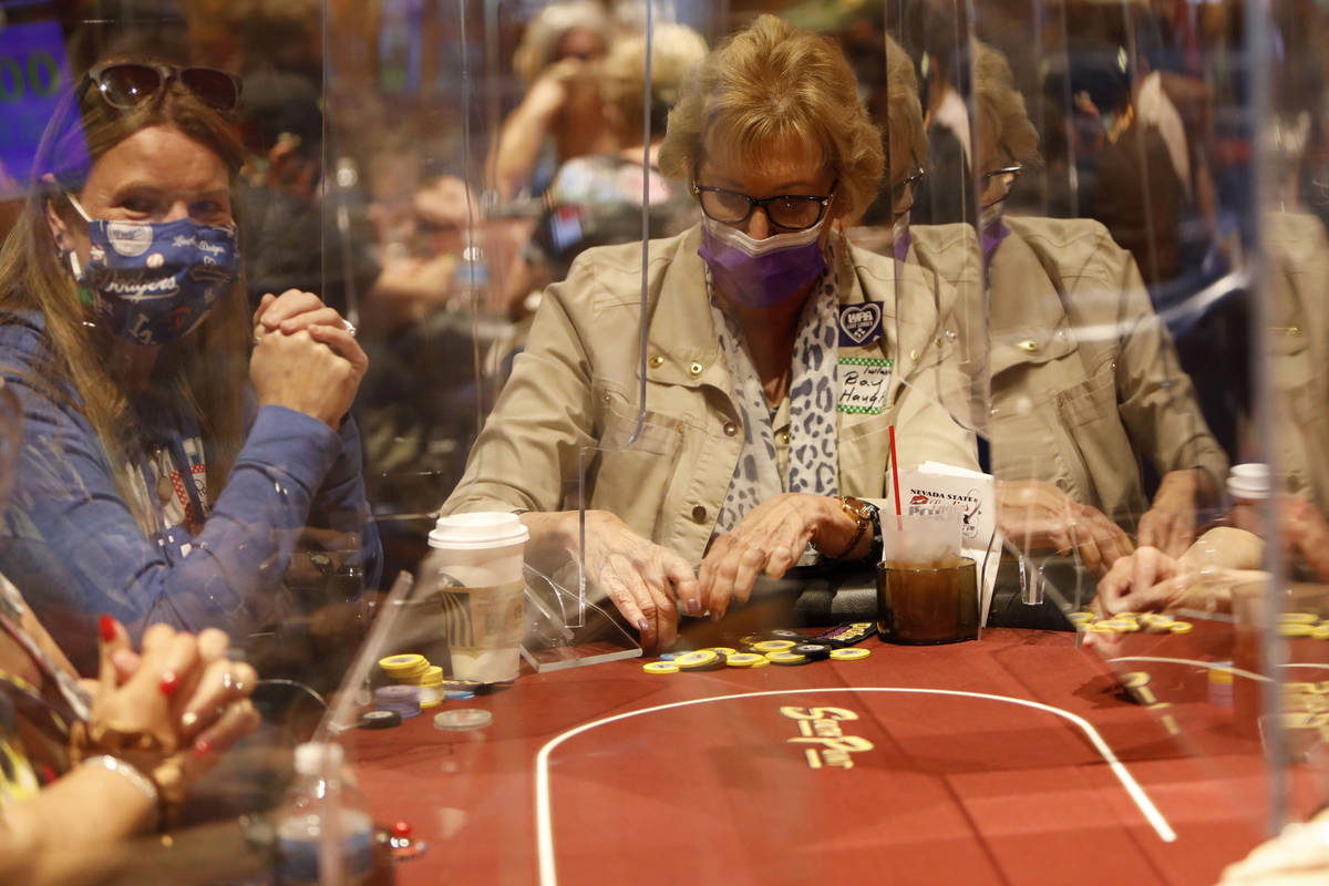 Pam Kocsis of Fresno, Calif., left, and Bay Haught of Chappell Hill, Texas, right, play in $175 ...
