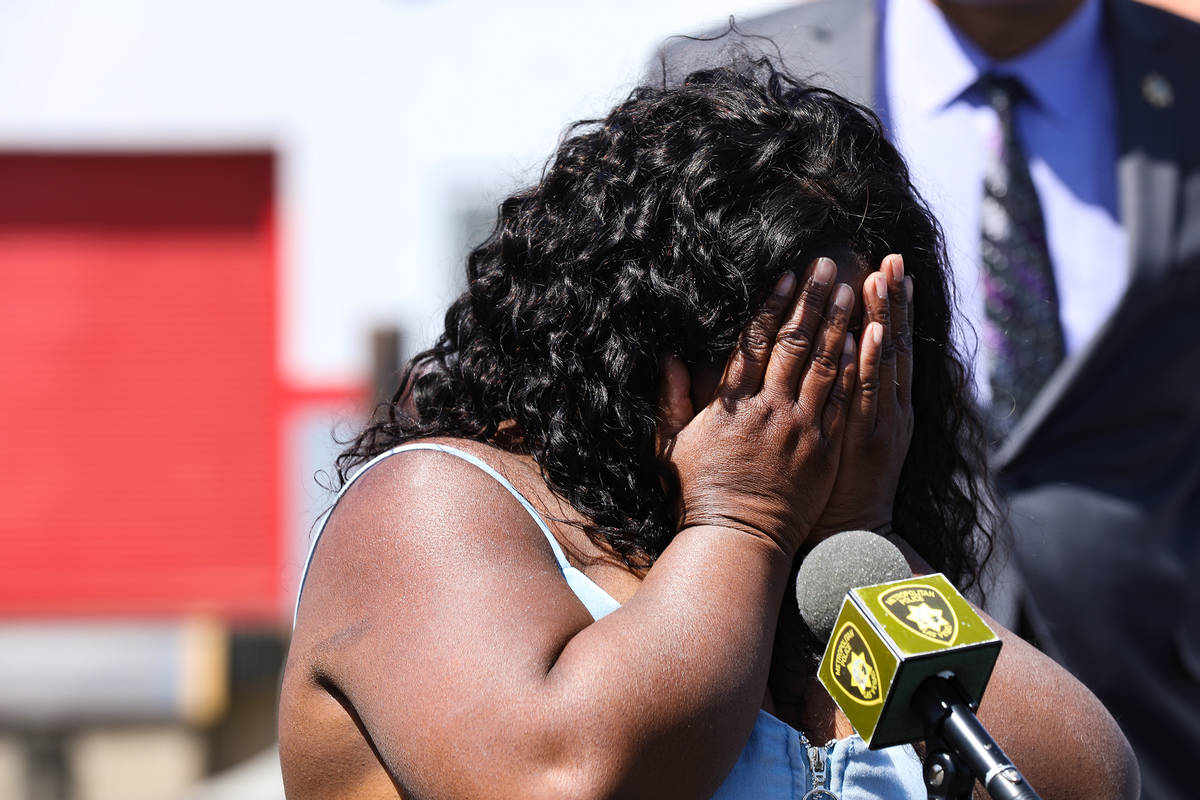 Maria Levi, mother of Kashif Brown, cries during a press conference with the Metropolitan Polic ...
