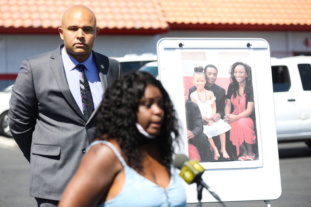 Maria Levi, mother of Kashif Brown, addresses the media in front of a photo of her son Kashif B ...