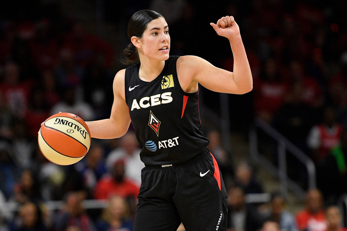 Las Vegas Aces guard Kelsey Plum dribbles the ball against the Washington Mystics during the se ...