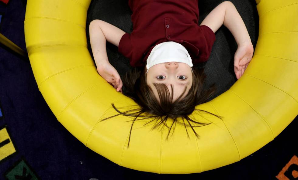 Akara Haase, 6, poses for a portrait in a learning and play area called The Park at the Center ...