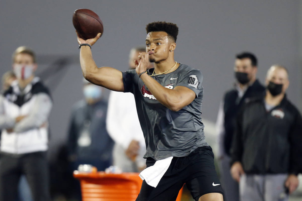 Quarterback Justin Fields throws as part of a drill during an NFL Pro Day at Ohio State Univers ...