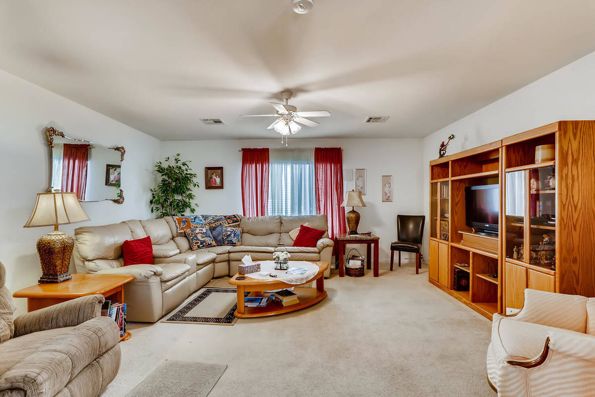 The living room at 9137 Dorrell Lane offers an open, airy feeling. (Virtuance)