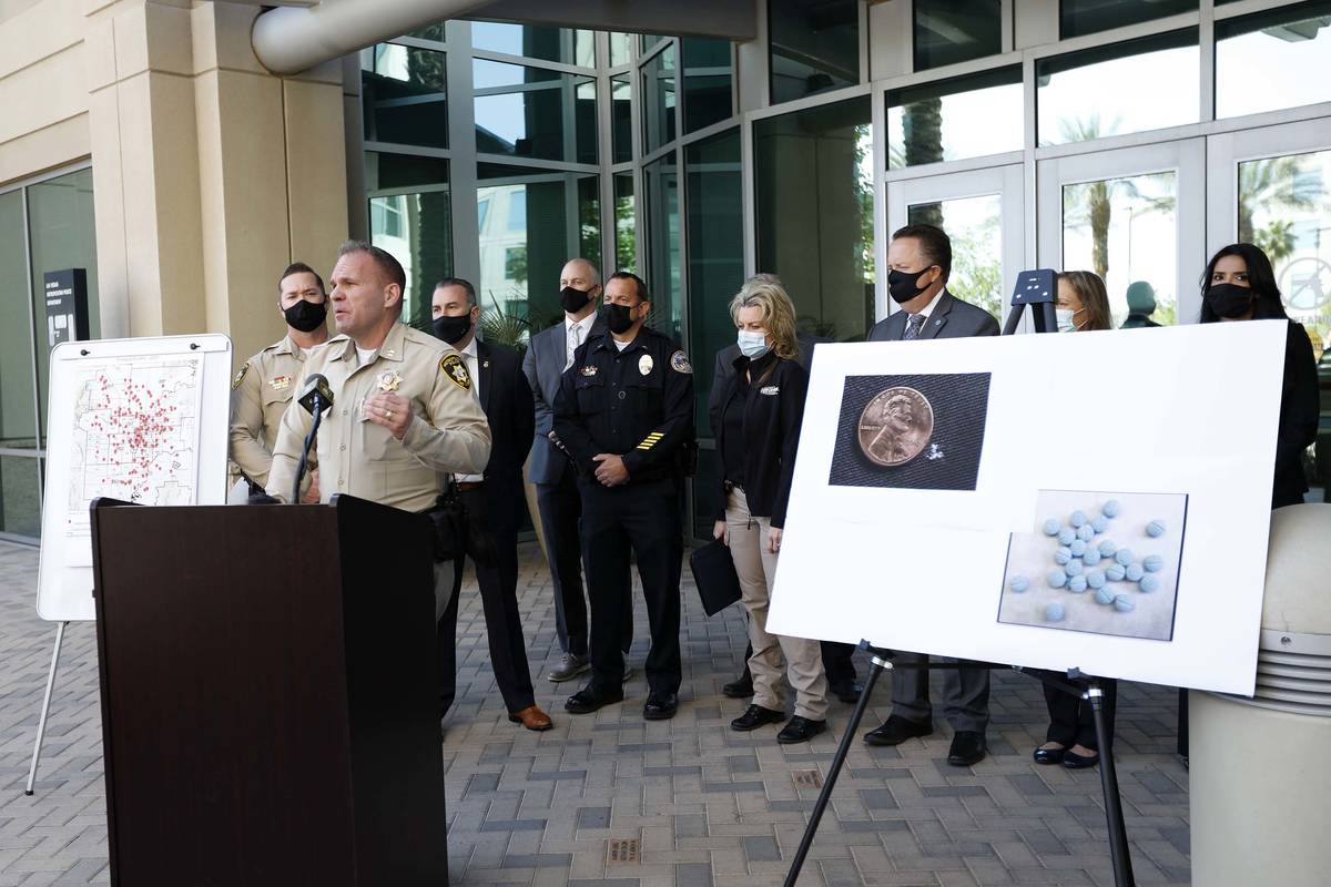 Metropolitan Police Department Narcotics Crimes Bureau Capt. John Pelletier, left, speaks durin ...