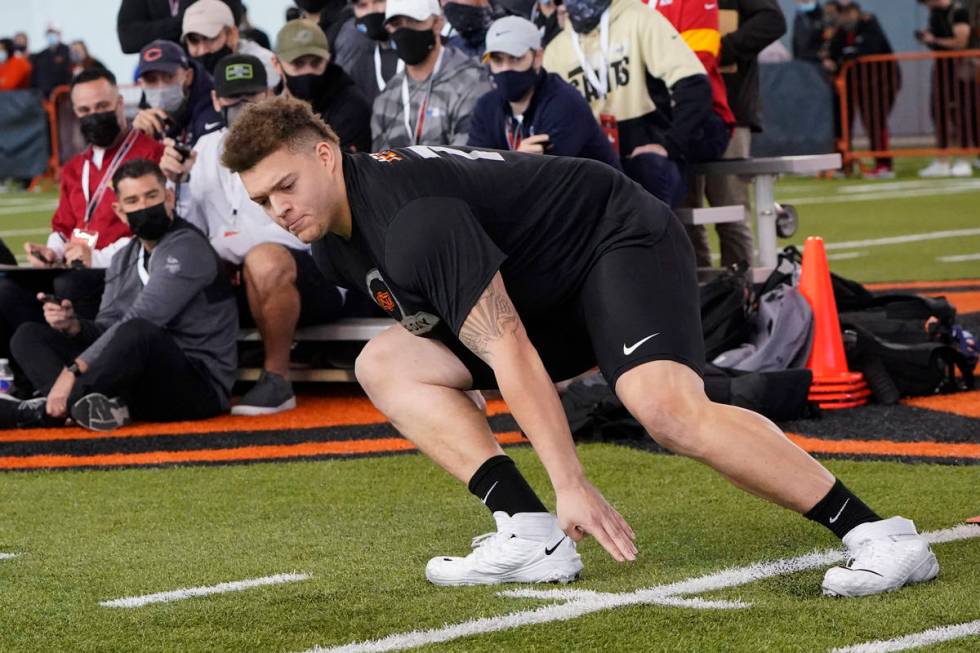 Oklahoma State offensive lineman Teven Jenkins participates in a drill at NFL football pro day, ...