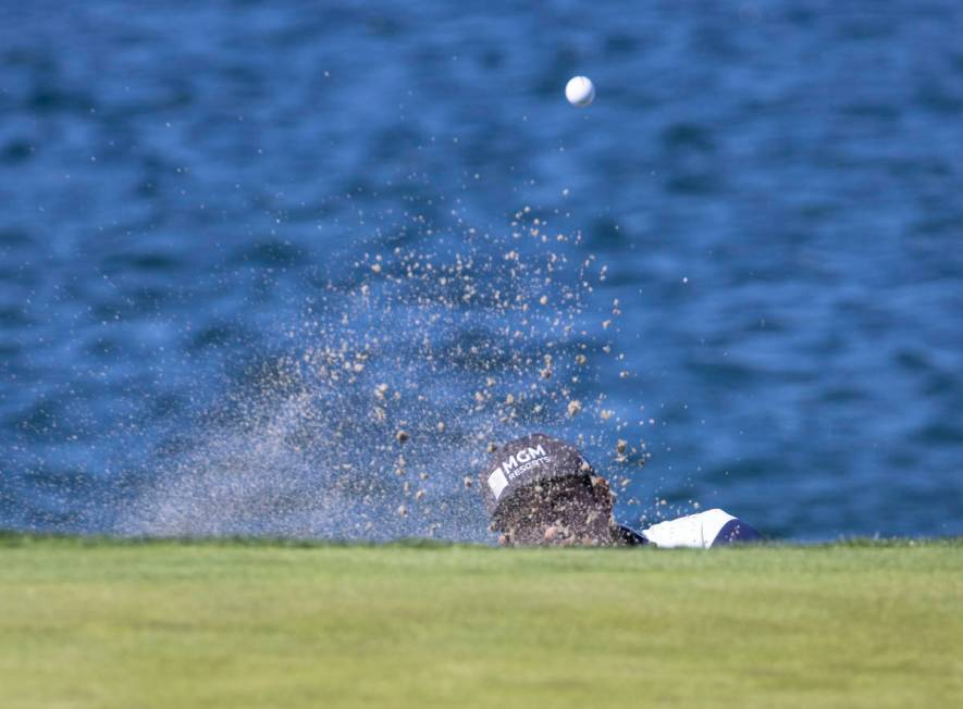 Alex Kang of Las Vegas hits out of a bunker on the fourth hole during the first round of the M ...