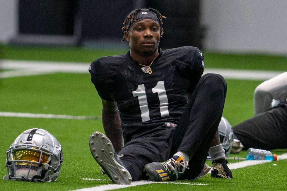 Las Vegas Raiders wide receiver Henry Ruggs III (11) stretches during a practice session at the ...