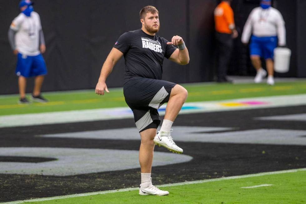 Las Vegas Raiders offensive tackle Kolton Miller (74) warms up before an NFL football game agai ...