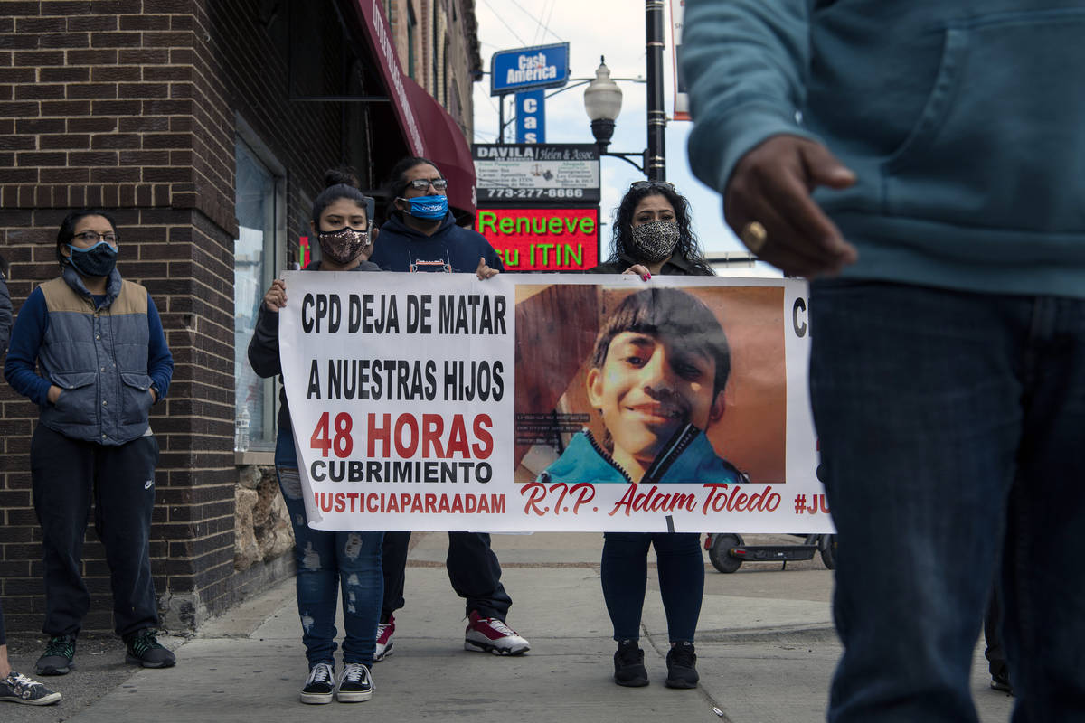 Community members rally on 26th St. after the body camera footage of Chicago police killing Ada ...