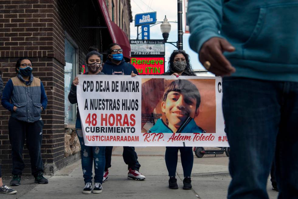 Community members rally on 26th St. after the body camera footage of Chicago police killing Ada ...