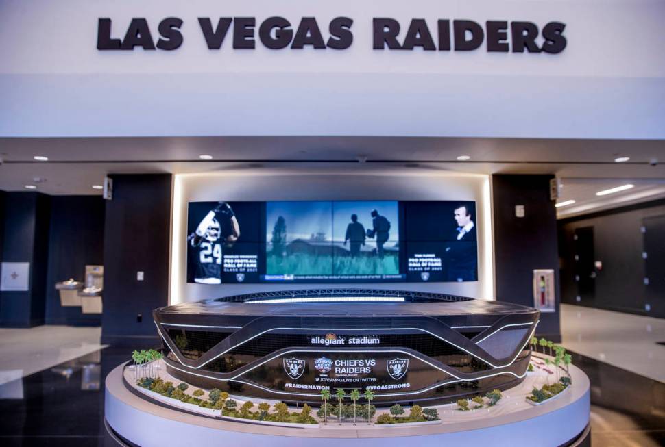 The front lobby of the Las Vegas Raiders headquarters features a model of Allegiant Stadium on ...