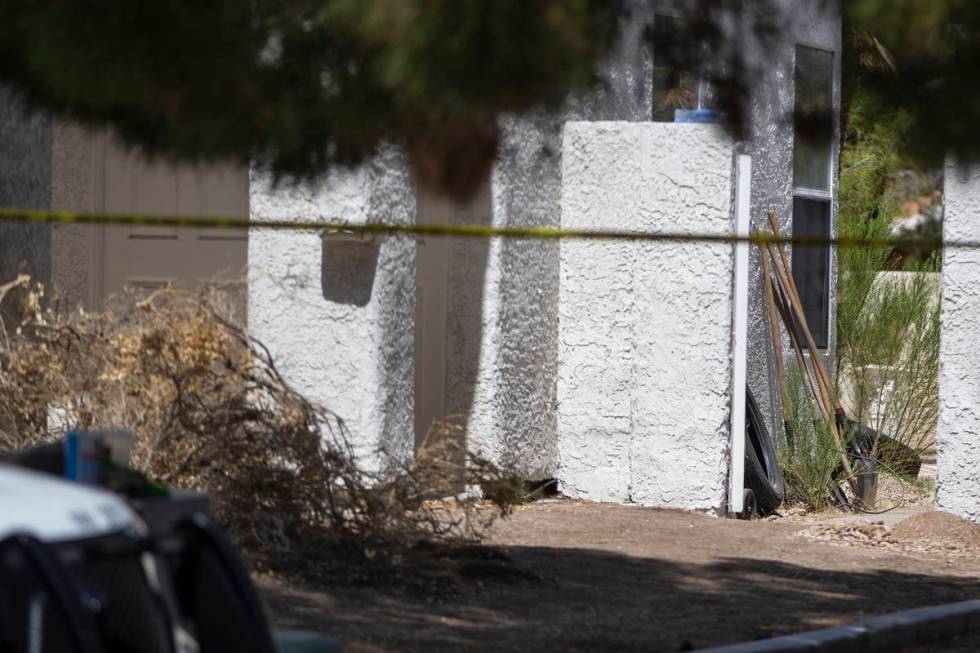 The Las Vegas Metropolitan Police Department investigate the discovery of human remains at a ho ...