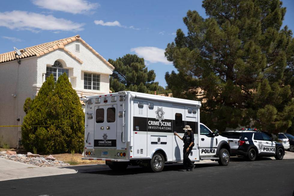 The Las Vegas Metropolitan Police Department investigate the discovery of human remains at a ho ...